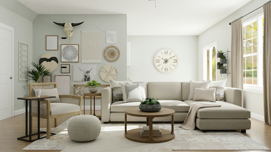 A round wooden coffee table in front of a cream sectional sofa